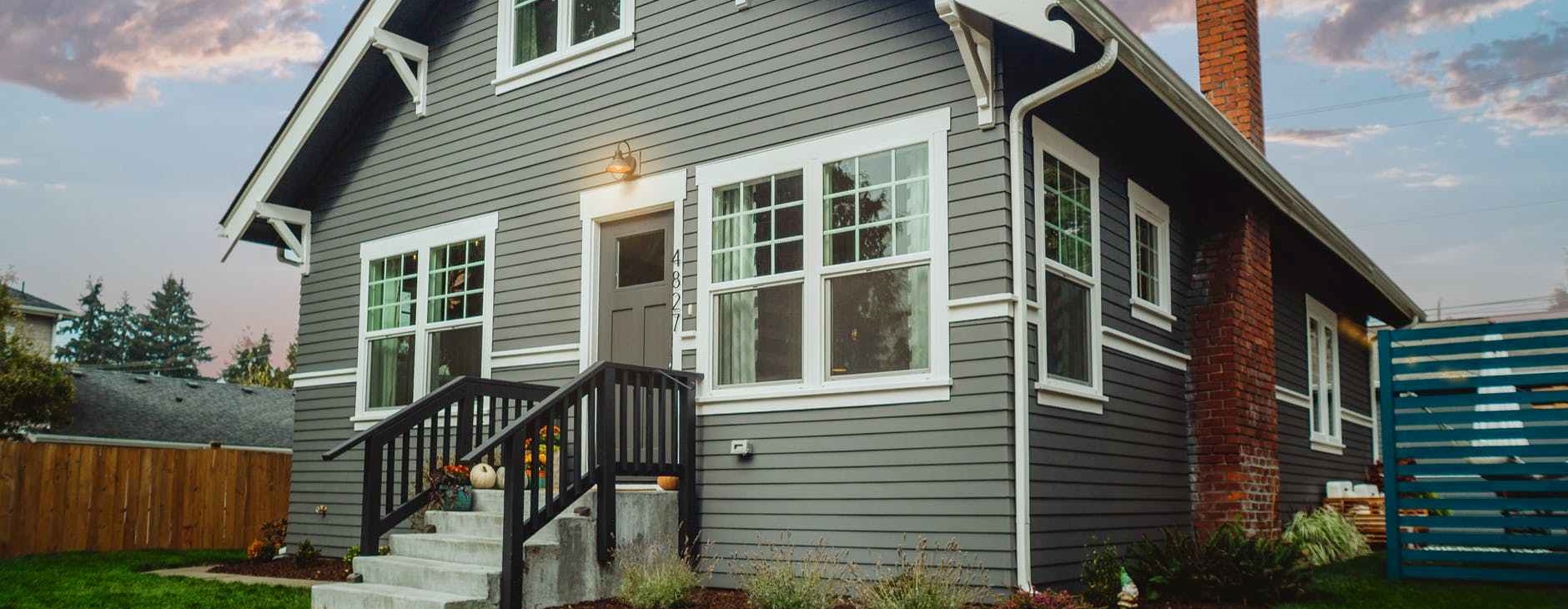 gray house under blue and gray sky